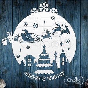 Weihnachten Winter Szene Dekoration SVG Schnittdatei, Runde Fensterdekoration Dorf Stadt, Flying Santa Schlitten svg, Rentier, Vektor Vorlage