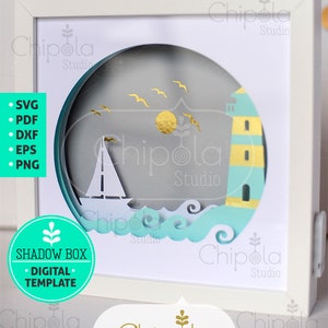 May include: A white frame with a light blue and yellow lighthouse, a white sailboat, and blue waves in a circle. The text "Chipola Studio" is on the frame and the text "SHADOW BOX DIGITAL TEMPLATE" is on a green circle.