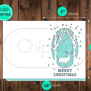 May include: A white card with a teal blue and white design of a deer in a forest. The card reads "Merry Christmas" and measures 5 inches by 7 inches when folded and 10 inches by 7 inches when open.