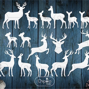May include: A set of 10 white silhouette cutouts of deer and reindeer in various poses. The cutouts are on a blue woodgrain background. The cutouts are perfect for crafting, scrapbooking, or decorating.