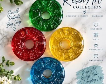 May include: Four circular resin ornaments in green, red, yellow, and blue, each embossed with the text LIFE SAVERS. The objects are arranged on a white marble surface. Text on the image includes Resin Art COLLECTION, Small Details Big Joy, and more.