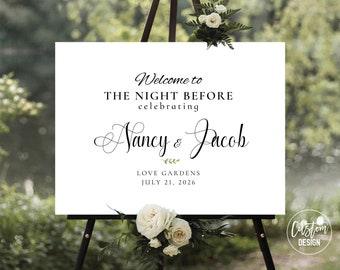 May include: White wedding welcome sign with black text that reads "Welcome to The Night Before celebrating Nancy & Jacob Love Gardens July 21, 2026".