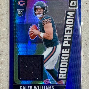 Cartão de calouro relíquia do Panini Donruss Optic Blue Hyper Rookie Phenom Patch 2024 Caleb Williams RC Chicago Bears