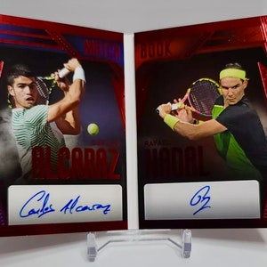 2023 Leaf History Book Matchbook Carlos Alcaraz/Rafael Nadal Red Holo Foil 1/3 Cartão de autógrafo de tênis