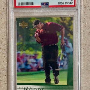 2001 Upper Deck Golf #1 Tiger Woods RC Rookie PSA 8 NM-Mint