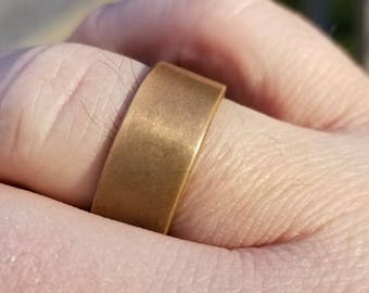 Hand forged brass ring that's handmade, rustic, with a polished or satin finish