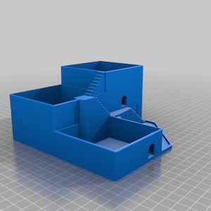 以下が含まれることがあります： 複数のレベルと階段を持つ建物の青い3Dプリントモデル。建物には小さな窓とドアがあります。