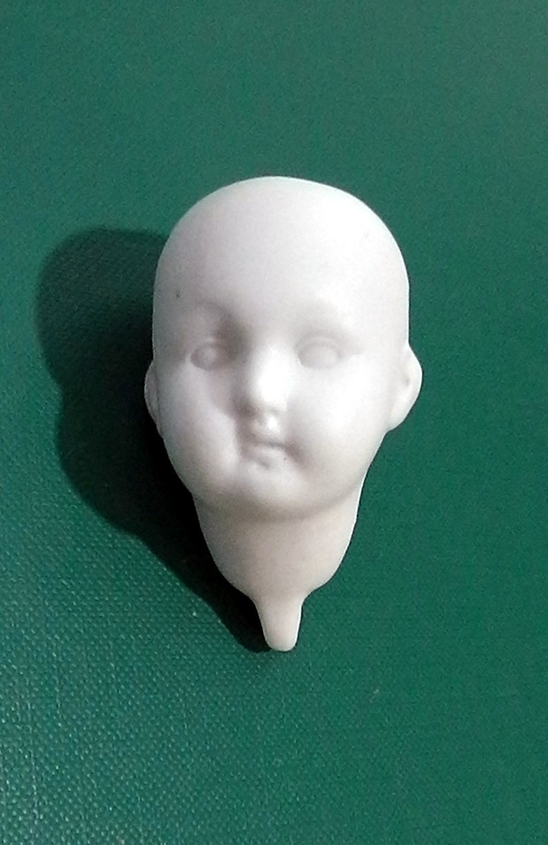 antique doll heads