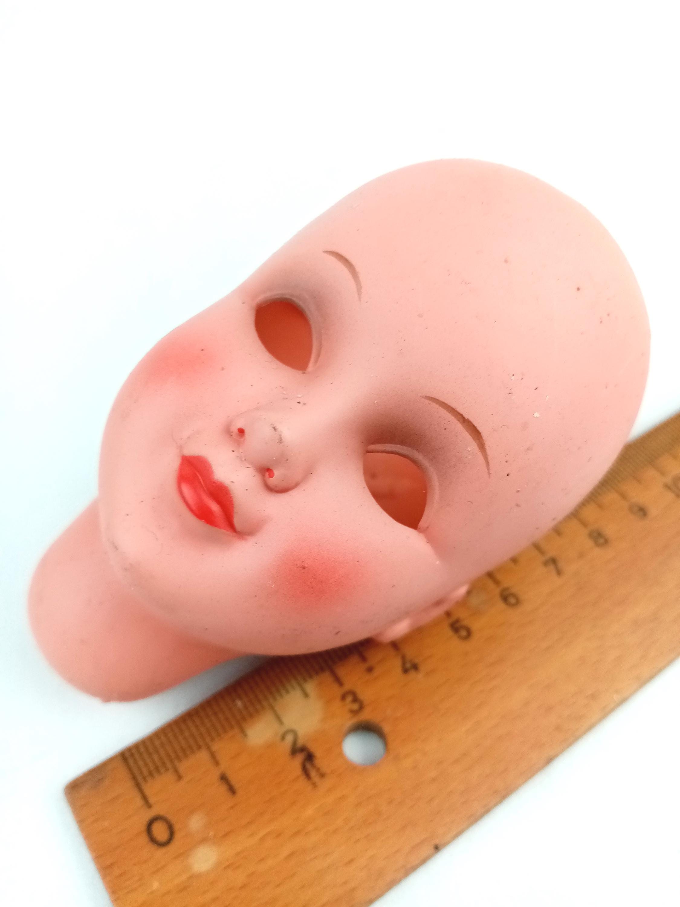 Tête de poupée en carton bouillie marquée Paris 501 12