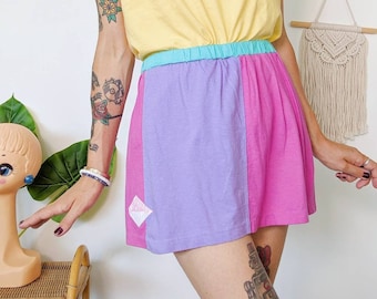 Le Coq Sportif purple and pastel pink mini tennis skirt | 80s vintage