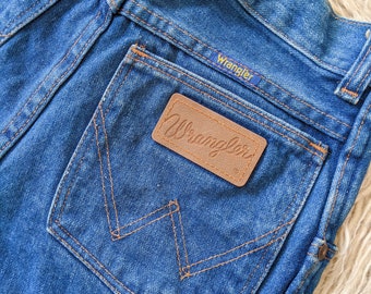 Jeans Wrangler en denim bleu, pantalon en jean coupe cigarette montante | vintage des années 80