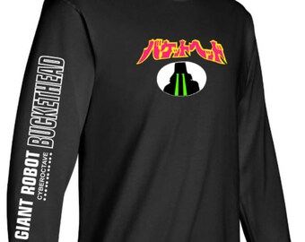 May include: Black long-sleeve t-shirt with a white graphic of a robot head with the text "Giant Robot Buckethead" on the left sleeve and "パケトヘッド" on the front.