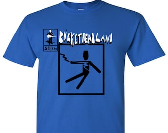 May include: A royal blue t-shirt with a black and white graphic of a stick figure being electrocuted. The text "BUCKETHEADLAND" is printed in white above the graphic. The text "51 136" is printed in white below the graphic.