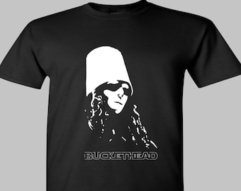 May include: Black t-shirt with a white silhouette of a person wearing a bucket hat and sunglasses. The text "Buckethead" is printed below the image.