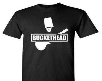 May include: Black t-shirt with a white graphic of a person wearing a bucket on their head and playing a guitar. The text "BUCKETHEAD" is printed in white below the graphic.