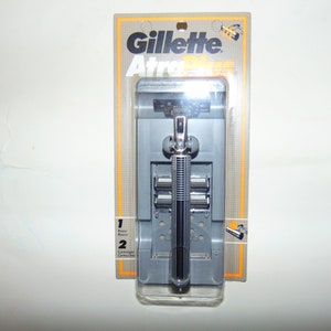 Atra Plus Metal Handle Razor with 2 Atra Plus Cartridges. Made in USA. Model 1990