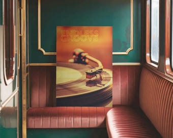 May include: A poster with the text "ENDLESS GROOVE" features a close-up of a vintage record player. The turntable is in focus, with the needle resting on a vinyl record. The poster has a warm, vintage aesthetic, with a blurred background.