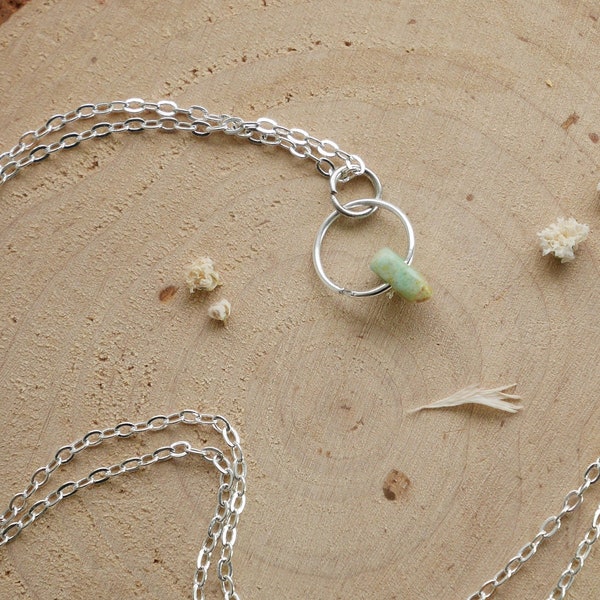 Necklace with small green stone