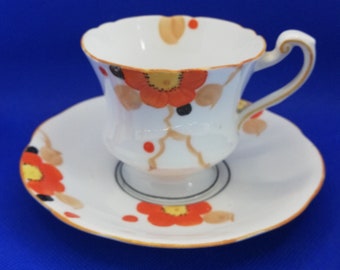 Tasse et soucoupe à thé Star Paragon avec anémone orange / assiette latérale / sucrier