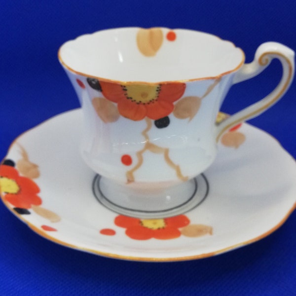 Star Paragon orange anemone tea cup and saucer / side plate / sugar bowl