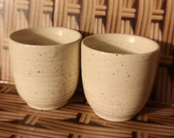 Pair of Churchill egg cups with in speckled cream ridged design
