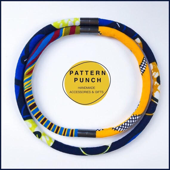 Contemporary, unique, handmade fabric rope necklace set in bold African wax print fabrics. Wear multiple ways using magnetic clasps.