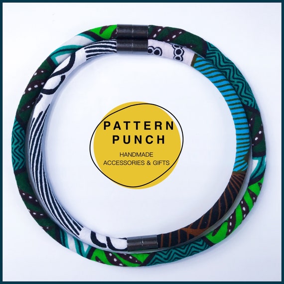 Contemporary, unique, handmade fabric rope necklace set in bold African wax print fabrics. Wear multiple ways using magnetic clasps.
