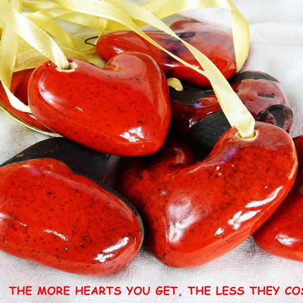 Red ceramic hearts for handmade ornaments for the Christmas tree or to hang them on the window - Italian artistic craftsmanship