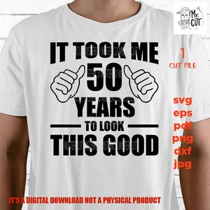 May include: A white t-shirt with black text that reads "It took me 50 years to look this good". The text is surrounded by two thumbs up symbols. The shirt is a digital download, not a physical product.