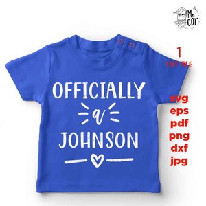 May include: A blue baby onesie with white text that reads "Officially a Johnson" with a heart symbol below the text.