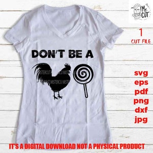 Könnte beinhalten: Weißes T-Shirt mit einer schwarzen Silhouette eines Hahns und einem Lutscher mit dem Text "DON'T BE A" darauf.