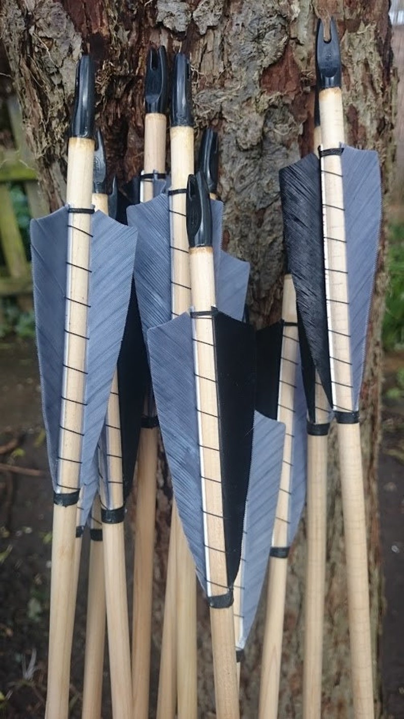 6 x high quality larp arrows,graded wood shaft, fully bound feather fletches in your choice of colours. image 1