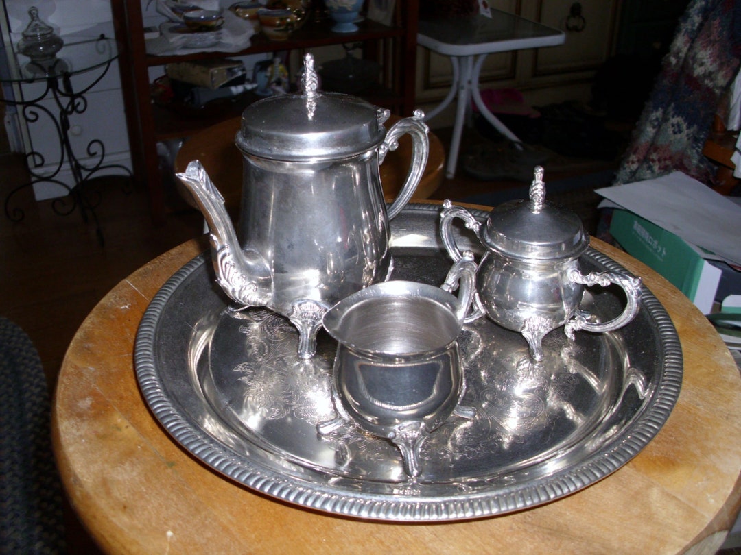 A Beautiful, Silverplated Fourpiece Miniature Tea or Coffee Set With
