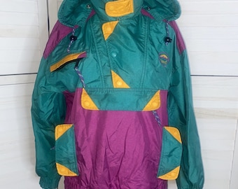 May include: A teal, purple, and yellow vintage ski jacket with a drawstring hood and a logo on the left chest.