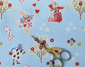 Alice in Wonderland Cotton Print Fabric from V&A Museum Pastel Blue Queen of Hearts Design