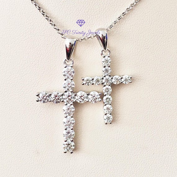 Mini Cross Bracelet with Sparkling Cubic Zirconia Rhodium on Silver Adjustable Length Mini Cross Bracelet with Sparkling Cubic Zirconia Rhodium on Silver Adjustable Length