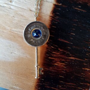 Necklace key to my heart 12 ga shotgun casing crystal swarovski blue bling. Bullet art