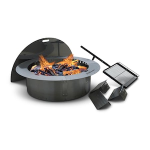 May include: A stainless steel fire pit with a lid, a grill grate, and a set of four fire pit screens. The fire pit is round and has a diameter of 36 inches. The fire pit is lit and has flames coming out of it.