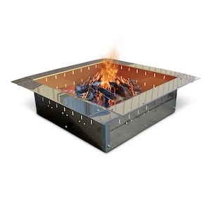 May include: A square, stainless steel fire pit with a bright orange interior and a roaring fire. The fire pit has a rectangular shape with a wide, flat rim and small ventilation holes along the sides. The flames are tall and vibrant, with wood logs burning inside.