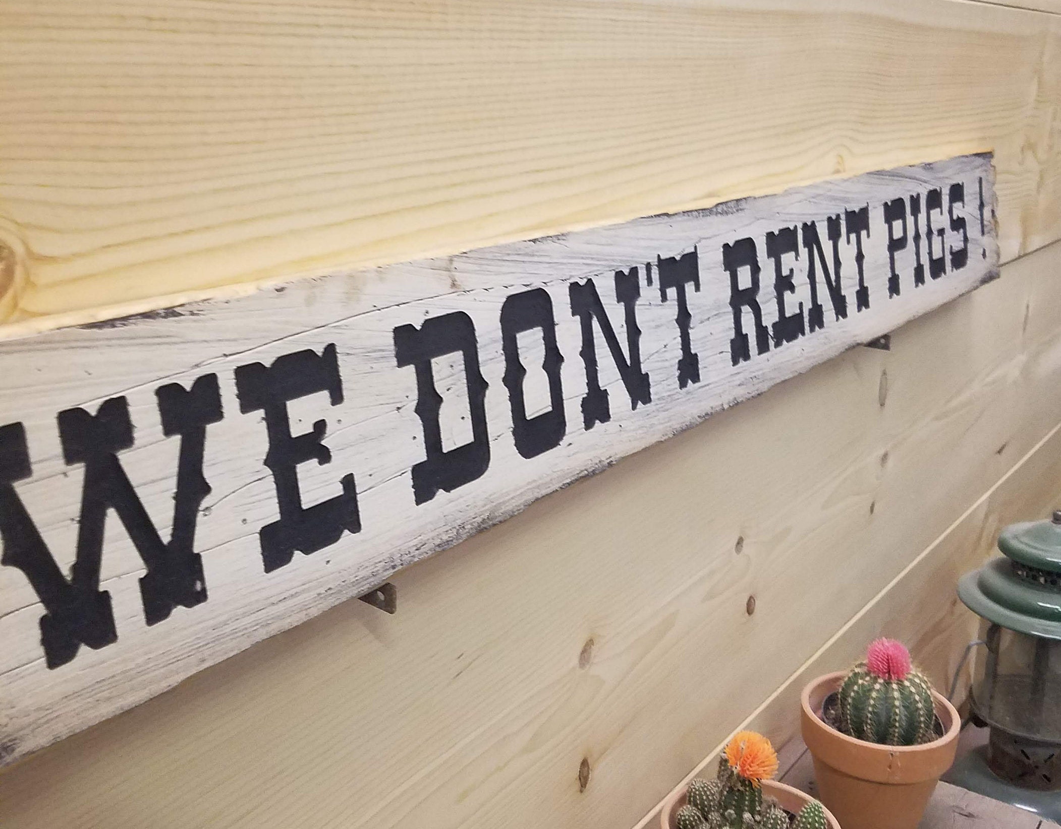 lonesome-dove-sign-we-don-t-rent-pigs-western-cowboy-old-west-ranch
