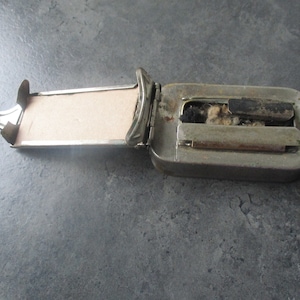 Antique pocket stove from the Art Deco period.