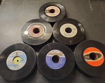 Lot of 200 45rpm pop music records from the 60's 70's 80's for arts and crafts or decorations