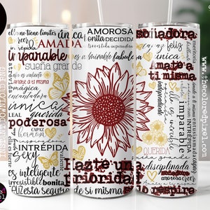 May include: A white tumbler with a red and gold sunflower design. The tumbler is decorated with Spanish words, including "Amorosa", "Soiladora", "Inparable", and "Querida". The tumbler is 9.4 inches tall and 8.2 inches wide.
