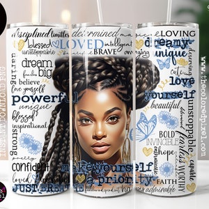 May include: A white tumbler with a black and blue design featuring a woman with braided hair and inspirational words like "loved", "powerful", "unique", "blessed", "dream big", "love yourself", "invincible", "hope", "faith", and "admirable".