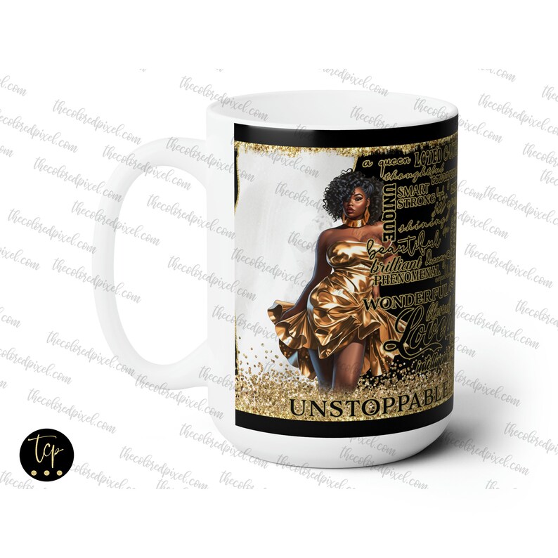 May include: White ceramic mug with a black handle. The mug features a black and gold design with a woman in a gold dress and the text "a queen LOADED with... UNIQUE, beautiful, smart, strong, amazing, brilliant, phenomenal, WONDERFUL, LOVE, UNSTOPPABLE".