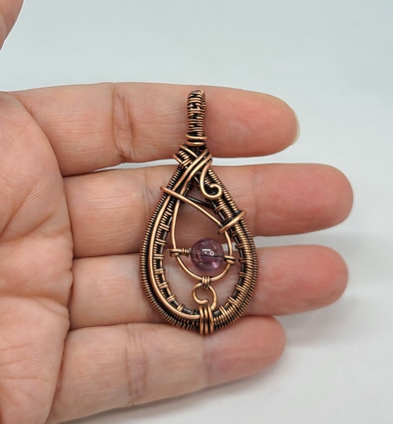 Phantom quartz bead pendant