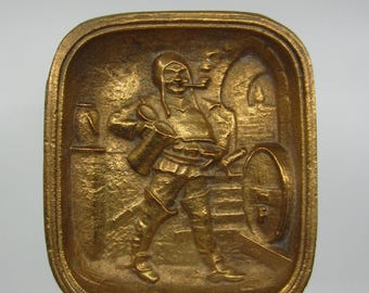 Vintage German small brass tray with relief decor Medieval soldier with beer stein smoking pipe in beer / wine cellar Humorous drinking gift