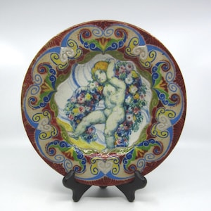 Vintage Catalan Josep Jordi Guardiola i Bonet ceramic plate with polychrome decor Putto with flower garland 1930s Barcelona Collectible gift
