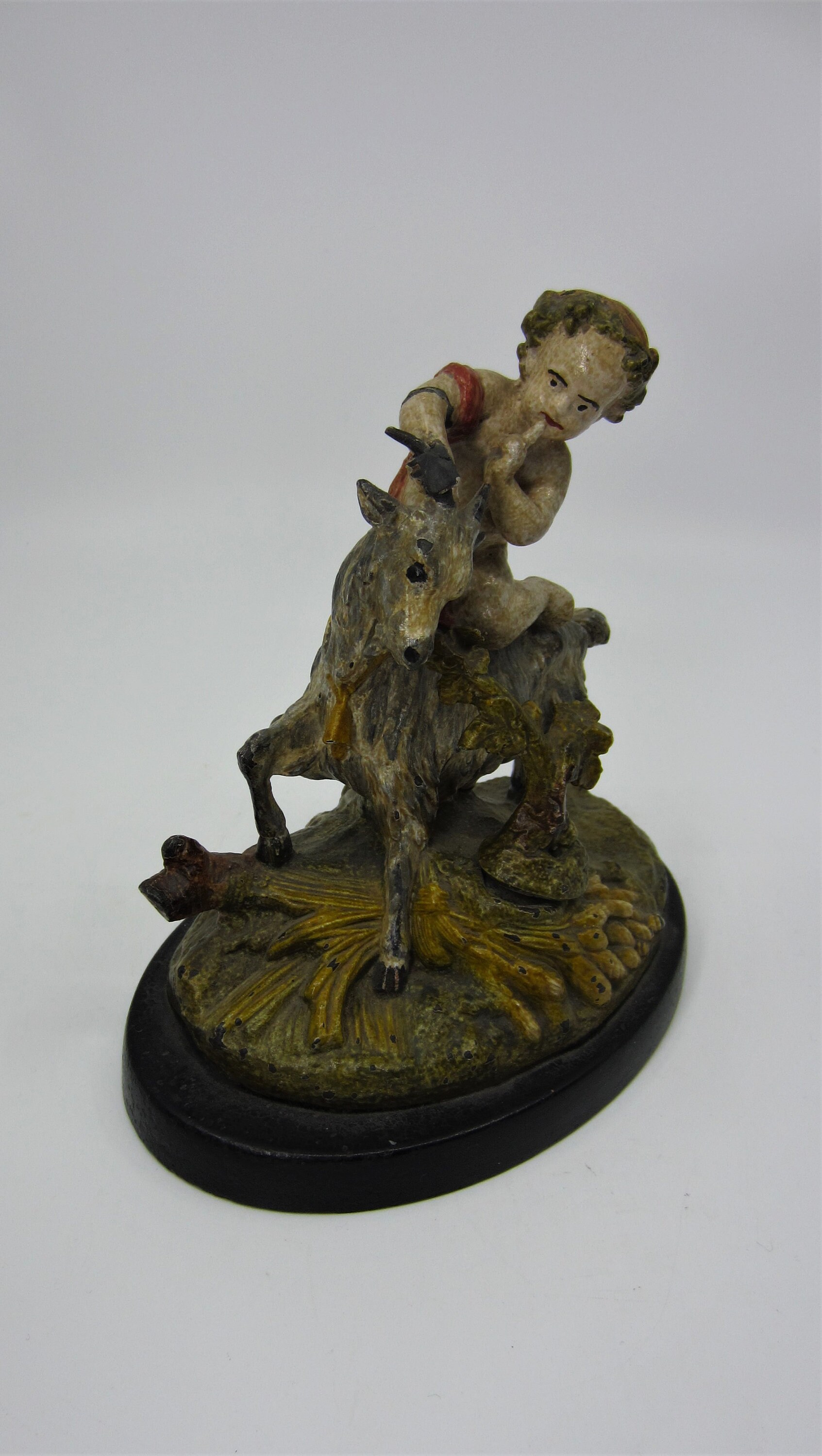 Zeus Riding A Antique Painted Metal Decorative Figure Putto Riding a Goat Baby Zeus ...