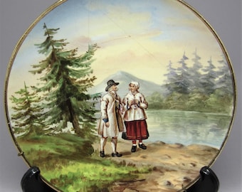 Antique Swedish Rörstrand hand painted porcelain wall plate / dish Couple wearing traditional folk costumes from Mora Dalarna Sweden 1800s